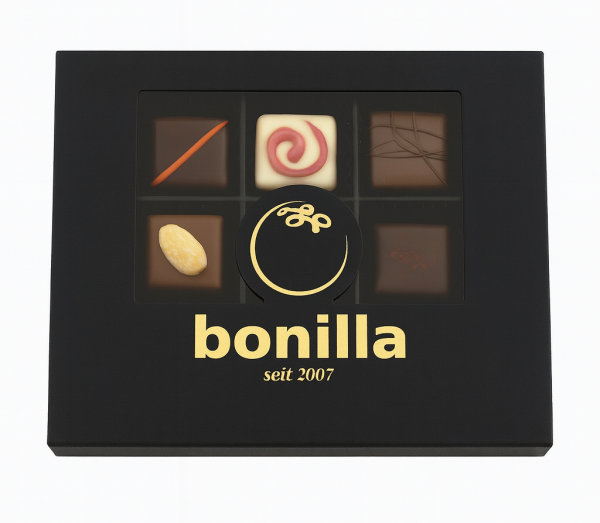 Klarsichtschachtel mit 9 Pralinen